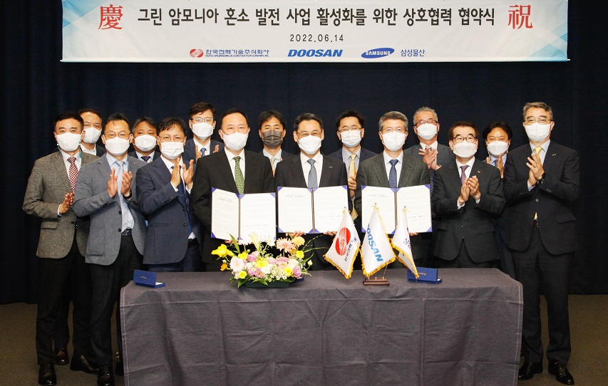 Related parties, incl. Sung-Arm Kim, CEO of KEPCO E&C; Yeonin Jung, COO of Doosan Enerbility; Sechul Oh, CEO of Samsung C&T’s Engineering & Construction Group (left to right of front row, the fourth, fifth and sixth persons), pose for group photo at signing ceremony for the “Business Cooperation Agreement on Promotion of Dual-Fuel Green Ammonia Projects” held at Bundang Doosan Tower on June 14th.