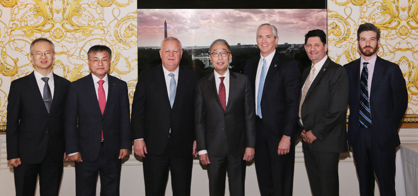 Doosan Enerbility’s senior management poses for a group photo with their counterparts in X-energy after their afternoon meeting on Apr. 25th in Washington, D.C. (From left to right) Hongkyu Kang, Doosan Enerbility’s VP of Nuclear Sales & Marketing; Jongdoo Kim, CEO of Doosan Enerbility’s Nuclear Business Group; Kam Ghaffarian, X-energy Founder & Chairman; Geewon Park, Doosan Enerbility Chairman & CEO; Clay Sell, X-energy CEO; Martin van Staden, VP of X-energy’s Reactor Development; Sam Levenback, VP of X-energy’s Corporate Development.